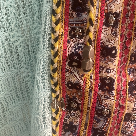 Free People XS sleeveless tunic wit hold. Slightly distressed.Beautiful colors - Picture 2 of 6